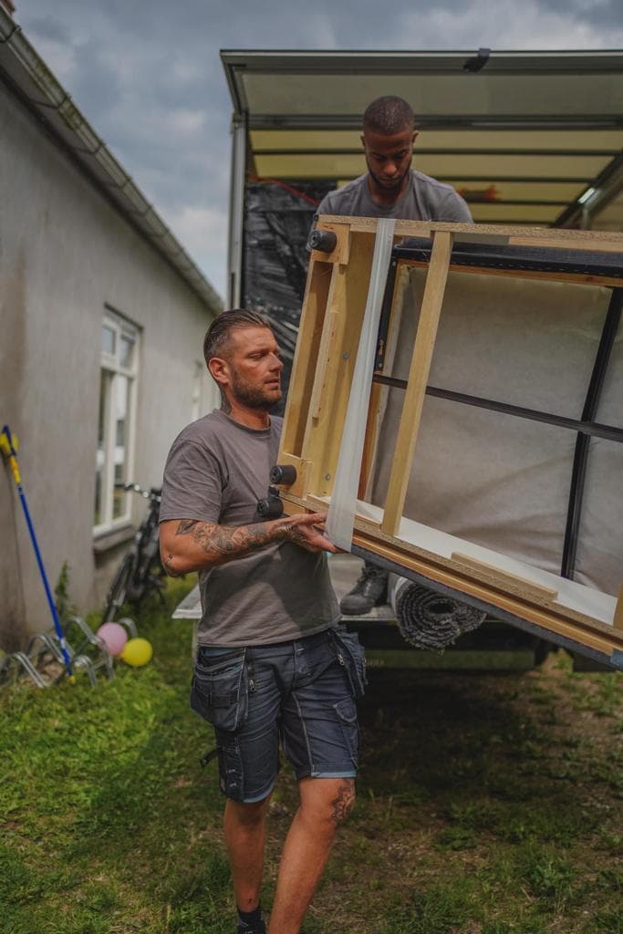 Sjouwers aan het werk tijdens een verhuizing